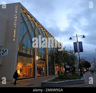 John Lewis & Partners, 123 High St, Cheltenham, Gloucestershire, England, UK, GL50 1DQ, store at dusk Stock Photo
