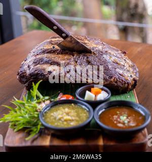 Close up of Slow Cooked Pork Ribs on a table Stock Photo