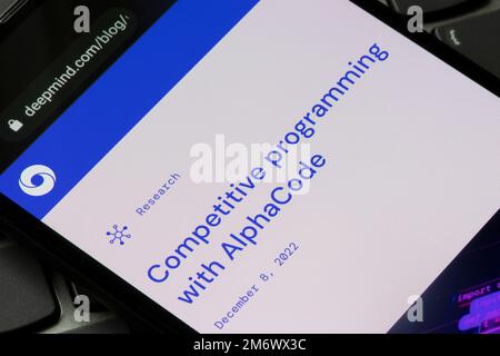 Blog about AlphaCode is seen on the website of DeepMind on a smartphone. AlphaCode is an AI coding system that aims to solve competitive programming ... Stock Photo