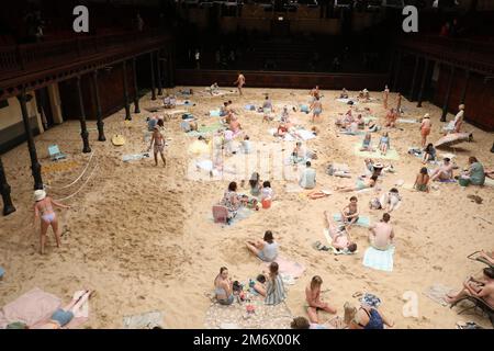 Sydney, Australia. 6th January 2023. Making its Australian premiere on Friday 6 January, the award-winning Sun & Sea will be staged in Sydney Town Hall and transformed to become a beachscape, complete with sand, sunbathers and holidaymakers. A sellout at the 2019 Venice Biennale where it was awarded the Golden Lion, Sun & Sea is a durational English-language opera work in-the-round that confronts themes of climate emergency with humour and power. Credit: Richard Milnes/Alamy Live News Stock Photo