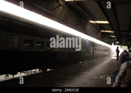 Passenger platform at Varanasi Junction railway station in Varanasi, Uttar Pradesh, India, on a rainy day. Stock Photo