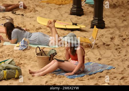 Sydney, Australia. 6th January 2023. Making its Australian premiere on Friday 6 January, the award-winning Sun & Sea will be staged in Sydney Town Hall and transformed to become a beachscape, complete with sand, sunbathers and holidaymakers. A sellout at the 2019 Venice Biennale where it was awarded the Golden Lion, Sun & Sea is a durational English-language opera work in-the-round that confronts themes of climate emergency with humour and power. Credit: Richard Milnes/Alamy Live News Stock Photo