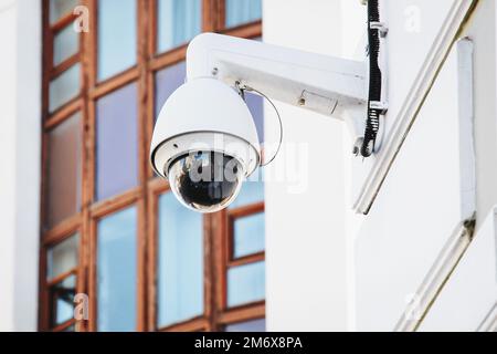 CCTV camera on the building, security surveillance outdoor camera Stock Photo