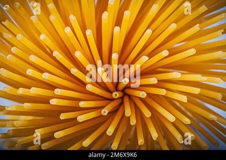 Bunch of wholegrain raw spaghetti food and drink concept. Stock Photo