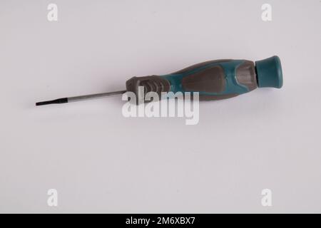 photo screwdriver metal with rubber handle on white background Stock Photo