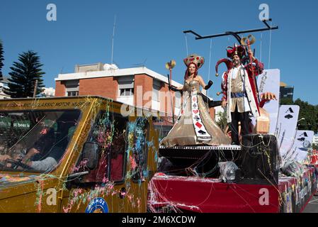 Happy people in teams dressed with colourful costumes parading at famous limassol carnival parade in cyprus Stock Photo