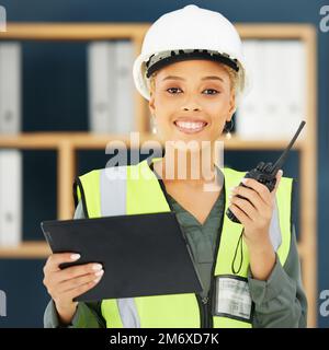 Construction, walkie talkie and portrait of black woman with tablet for engineering, building and architecture. Leadership, vision and female Stock Photo