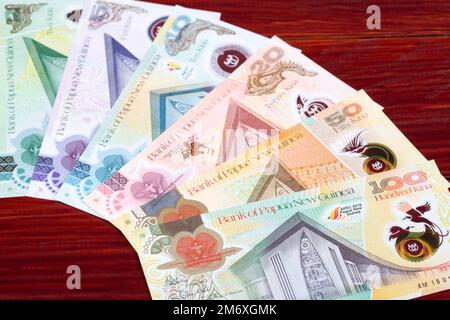 Papua New Guinean kina a business background Stock Photo