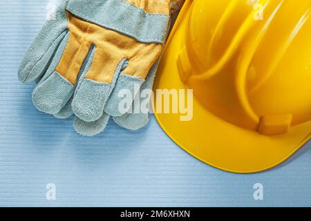 Construction hard hat protective gloves. Stock Photo