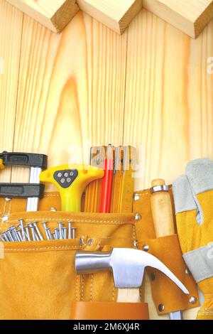construction tools in belt on wooden boards Stock Photo