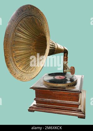 Vintage Gramophone: old retro gramophone isolated green background with clipping path. Stock Photo