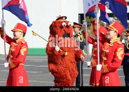 Tokyo, Japan. 6th Jan, 2023. TV character Mukku (C) participates an annual fire brigade review in Tokyo on Friday, January 6, 2023. Some 2,500 personnel and 99 vehicles participated the New Year event. Credit: Yoshio Tsunoda/AFLO/Alamy Live News Stock Photo