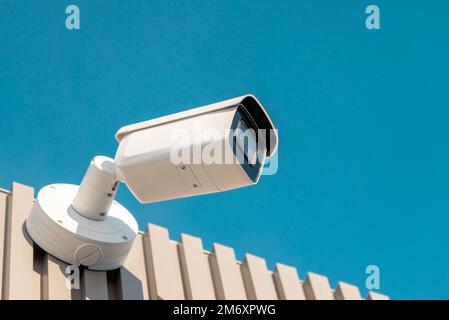 Wall mounted modern IP CCTV security camera. Home and workplace security concept Stock Photo