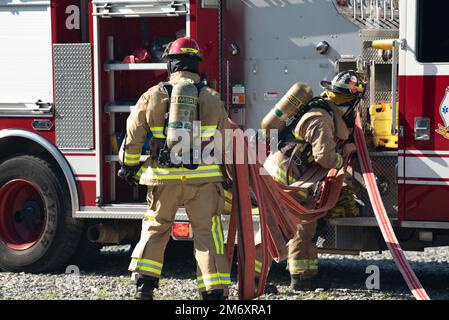 A firefighter from the 23d Civil Engineer Squadron takes a break during ...