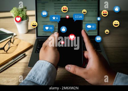social media marketing internet network technology digital online  close up on man hand using computer Stock Photo