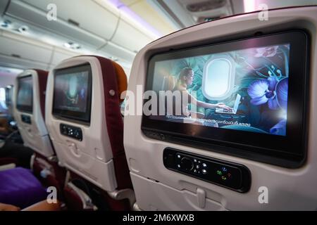 PHUKET, THAILAND - CIRCA JANUARY, 2020: close up shot of seat back screen on board of Thai Airways Airbus A350. Stock Photo