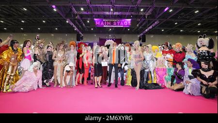 Drag queens pose with RuPaul (centre) ahead of a catwalk show for the ...