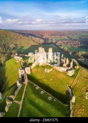 Corfe Castle, Dorset, UK.  6th January 2023.  Early morning sunshine at Corfe Castle in Dorset shortly after sunrise.  Picture Credit: Graham Hunt/Alamy Live News Stock Photo