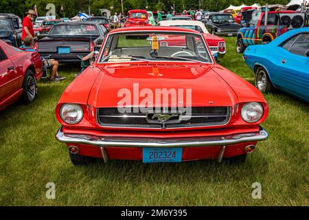 Iola, WI - July 07, 2022: High perspective front view of a 1966 Ford Mustang GT Coupe at a local car show. Stock Photo
