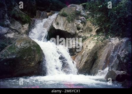 Kempty Falls is a popular picnic spot located at 15 km from Mussoorie city. Situated at a height of 4500 ft between Mussoorie valley Stock Photo