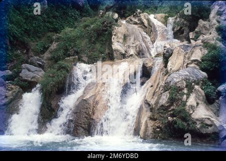 Kempty Falls is a popular picnic spot located at 15 km from Mussoorie city. Situated at a height of 4500 ft between Mussoorie valley Stock Photo