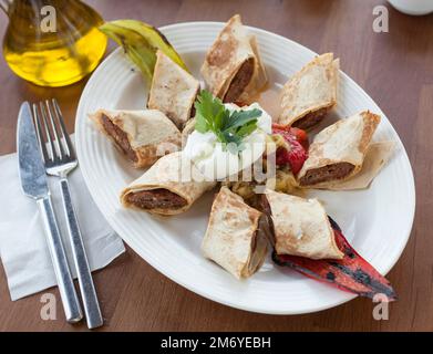 beyti kebab served on a plate Stock Photo