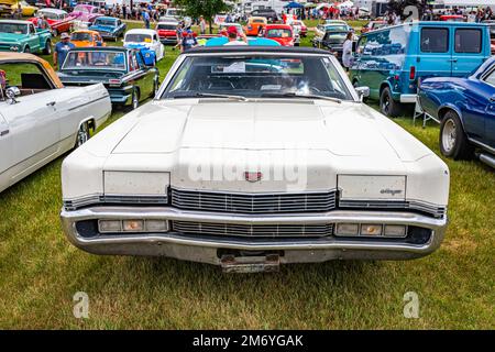 Iola, WI - July 07, 2022: High perspective front view of a 1970 Mercury Marquis Convertible at a local car show. Stock Photo