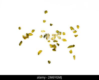 Ground, milled, crushed or granulated pistachio pile isolated on white background Stock Photo