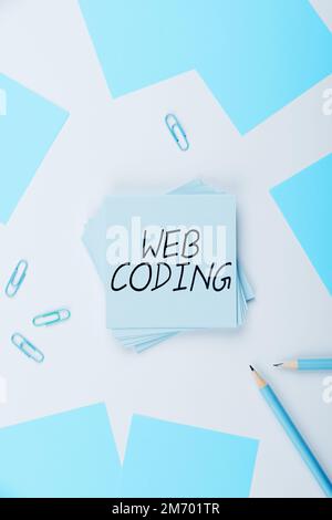 Writing displaying text Web Coding. Internet Concept work involved in developing a web site for the Internet Stock Photo