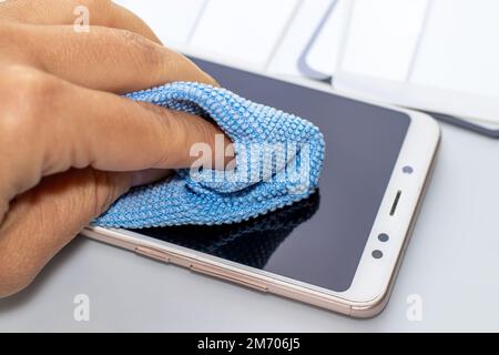 maintenance and repairing smartphones. many tempered glass screen protector and mobile phone, replace concept Stock Photo
