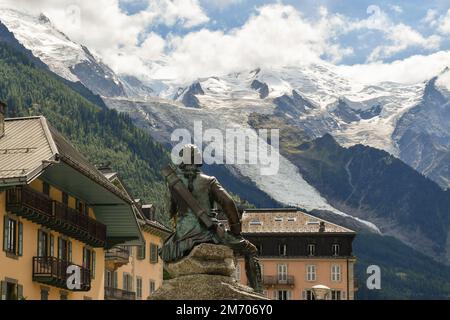 Statue of Michel Gabriel Paccard, alpinist and botanist, in the centre of Chamonix with the Mont Blanc in the background, Haute Savoie, France Stock Photo