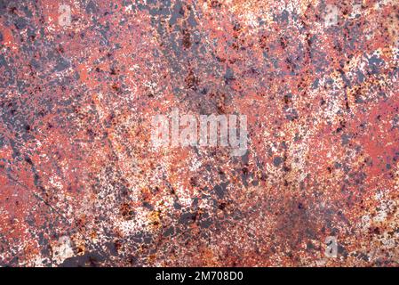 rust texture. rust texture colored in red. Background colored red. Background of standby paint in red color Stock Photo
