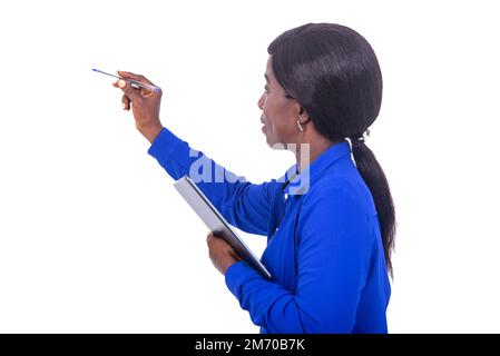 beautiful businesswoman in blue shirt standing on white background performing training while smiling. Stock Photo