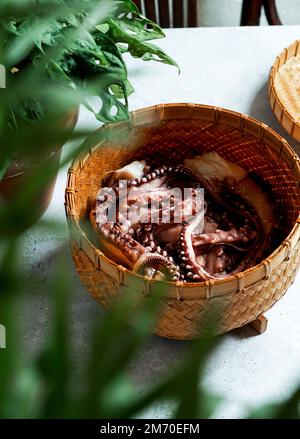 Steaming Octopus steamed octopus in a bamboo steamer, Asian style Stock Photo - Alamy