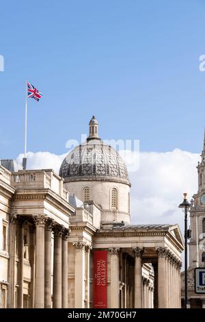 A Union Jack flag flying over, The National Gallery, Trafalgar Square, London, UK.  26 Sep 2022 Stock Photo