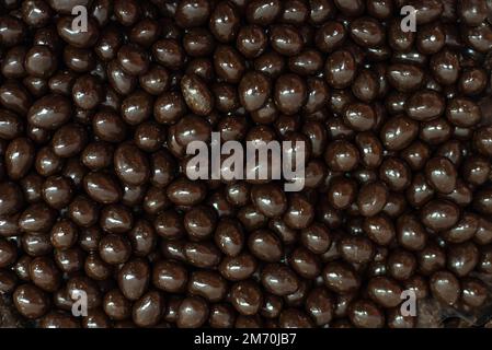 many colored marmalade candies laid out on a flat surface; dessert for the holiday; sweet gifts for children; texture and background with small candie Stock Photo