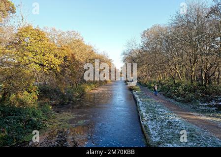 The start of the  Basingstoke canal at New Haw on a cold and frosty winters day, Surrey England UK Stock Photo