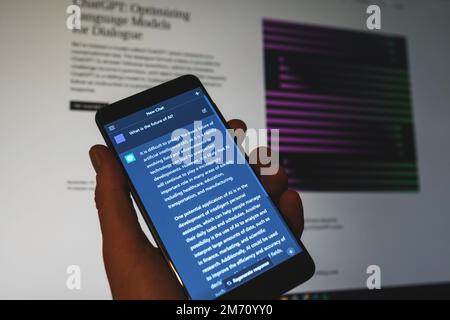 ChatGPT Open AI chat bot on phone screen. AI chatbot response to the prompt about the future of AI. Swansea, UK - January 3, 2023. Stock Photo