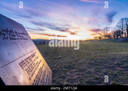 Wien, Vienna: Sigmund Freud stele, meadow and viewpoint Bellevuewiese, leafless trees, fiery sunset in 19. Döbling, Wien, Austria Stock Photo