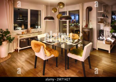 Festively set table for meat fondue, Christmas decoration, oven, Stuttgart, Baden-Wuerttemberg, Germany Stock Photo