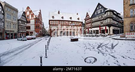 Panorama photo market place with half-timbered houses on it with snow, Alsfeld, Hesse, Germany Stock Photo