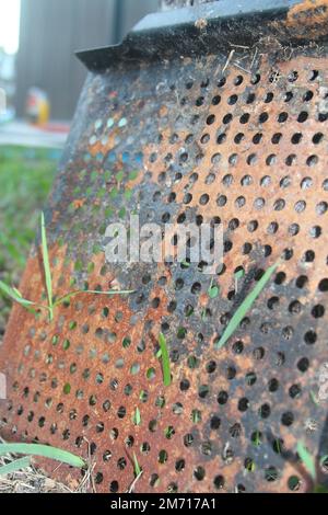 Rusted grill grate with holes - texture close up Stock Photo