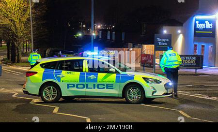 Glasgow, Scotland, UK 6th January, 2023.  Great western road was closed in easterly direction at blairdardie school bus stop as the busy bus route saw a traffic incident involving a car and pedestrian a large area was taped off for forensics.. Credit Gerard Ferry/Alamy Live News Stock Photo