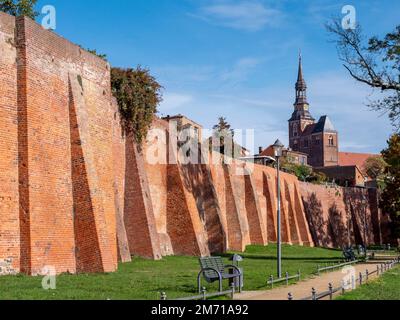 Brick city wall and in the background the Protestant Church of St. Stephan, Imperial and Hanseatic City of Tangermuende, Stendal County Stock Photo