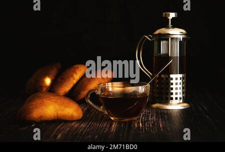 Pies with a cup of tea on the table Stock Photo