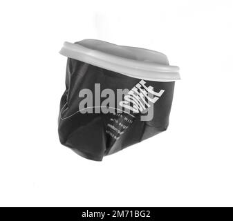 Crumbled black paper coffee cup isolated on white background Stock ...