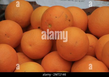 Bunch of fresh tangerines oranges on market Stock Photo