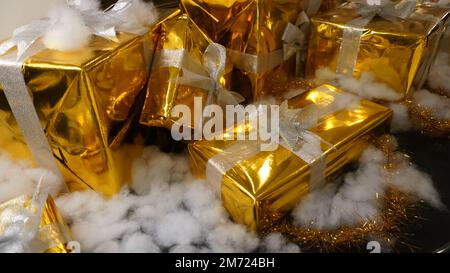 Collection of yellow color gift boxes with ribbons Stock Photo