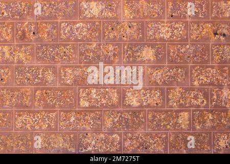 Red brick wall made of stone, Brick wall background. Stock Photo