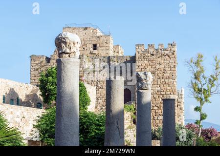 Roman columns and Byblos citadel, Crusader castle, Jbeil, Lebanon Stock Photo